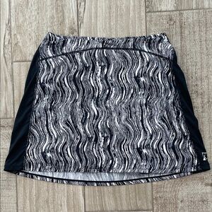 SkirtSports black and white patterned skort, size Medium